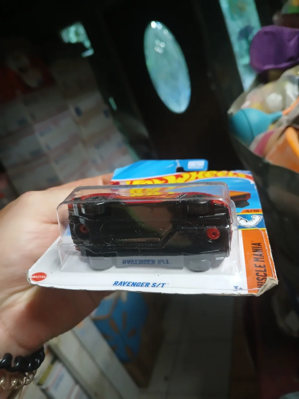 Hot Wheels Ravenger S/T is a 1:64 scale die-cast muscle car featured in the Musc